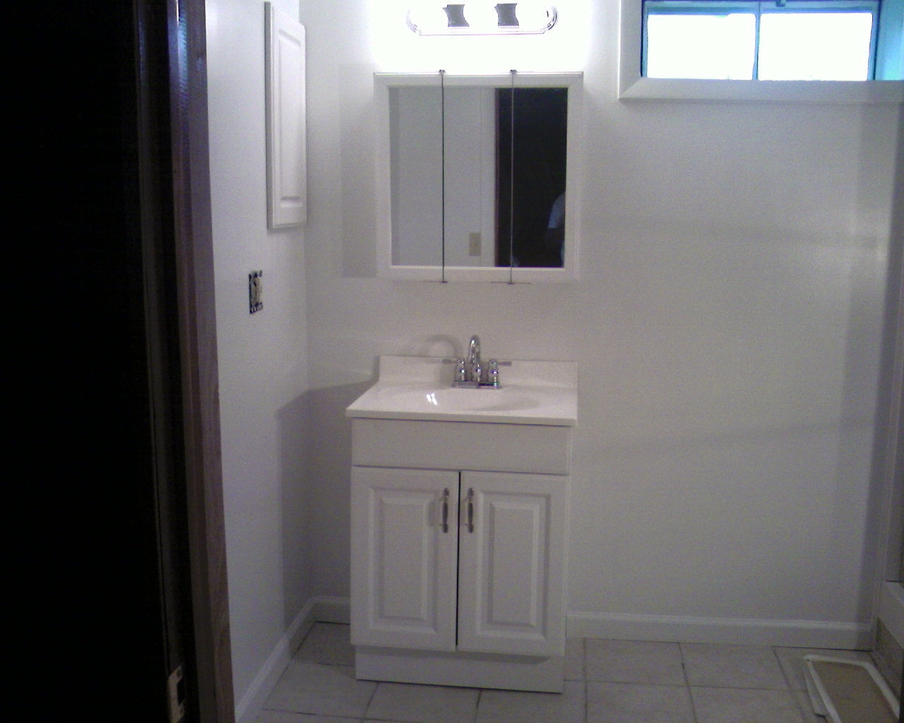 Basement sink and vanity unit