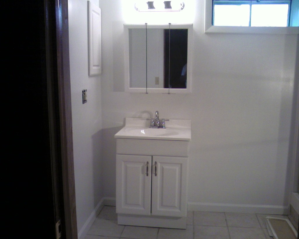 Basement sink and vanity unit