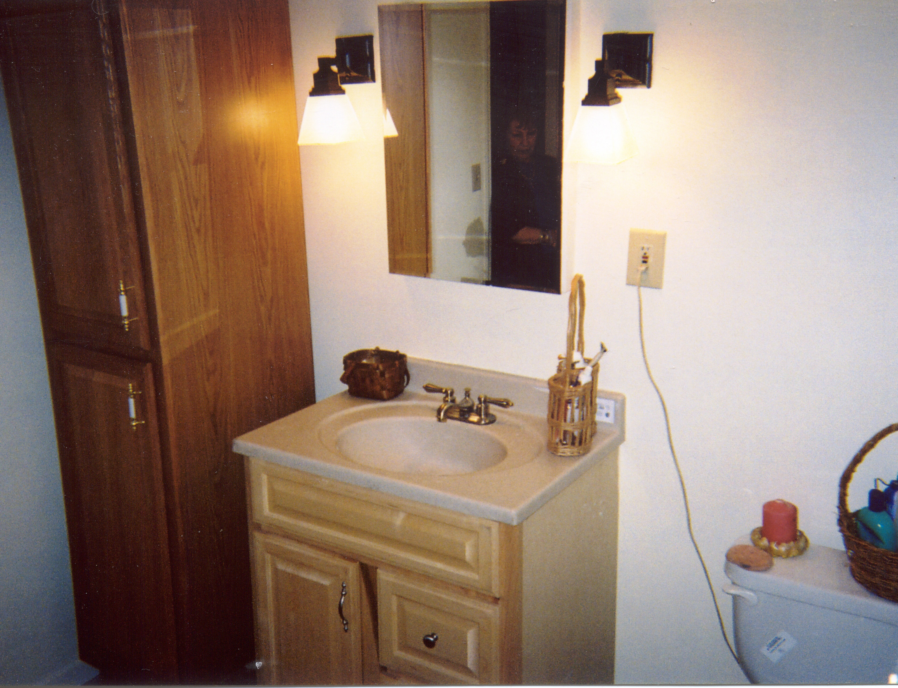 Bathroom remodeling with tub, vanity and toilet.