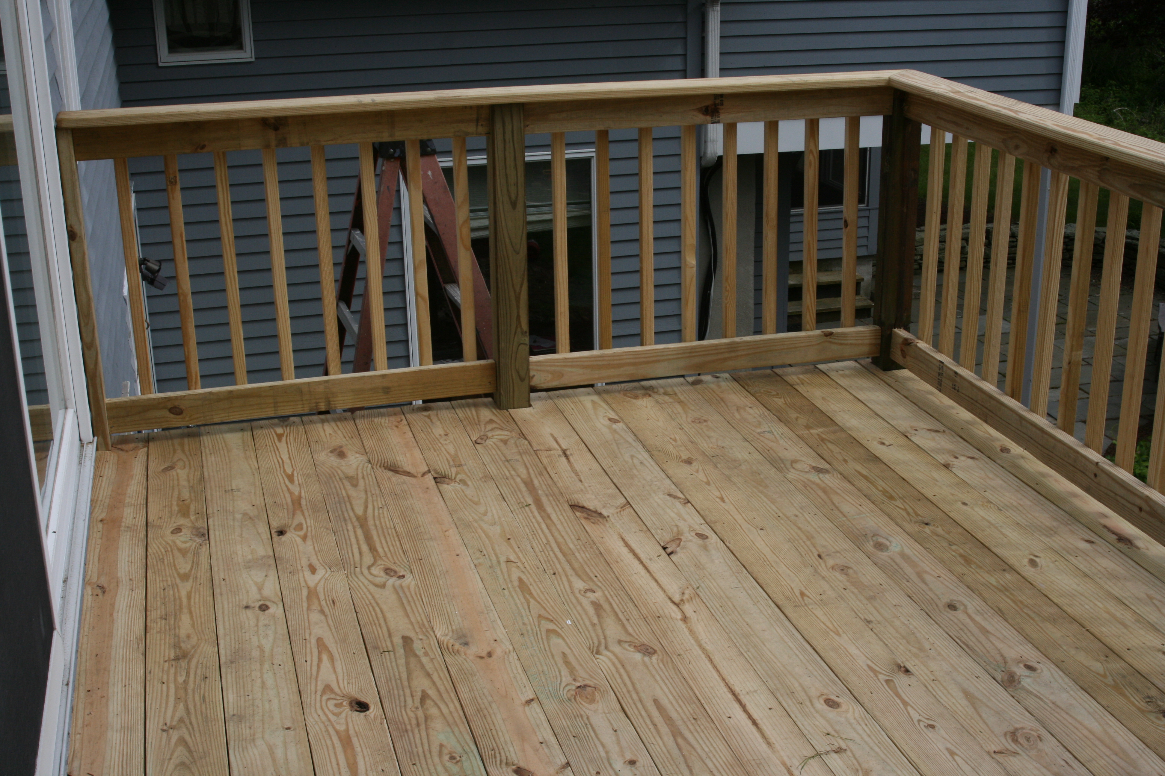 Refurbished second floor deck: Decking planks and railings